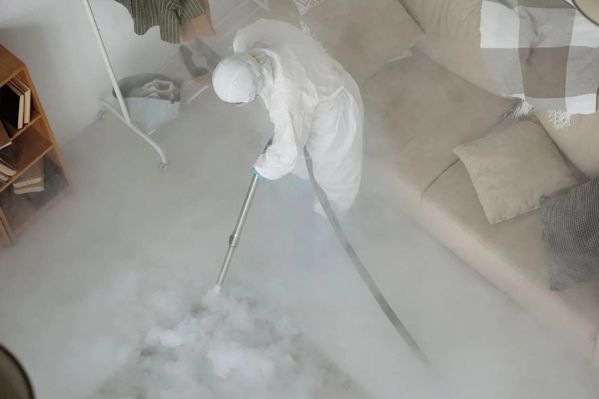 Biohazard cleanup technician in protective equipment, Sayville, NY